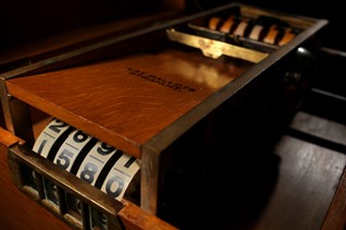 An image of the internal mechanism inside the wooden ballot box that the Town of Shutesbury has been using since 1934